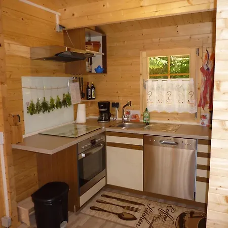 Holz-blockhaus Fuer Vier Personen Mit Terrasse Und Komplett Eingezaeuntem Grundstueck Semesterbostad *