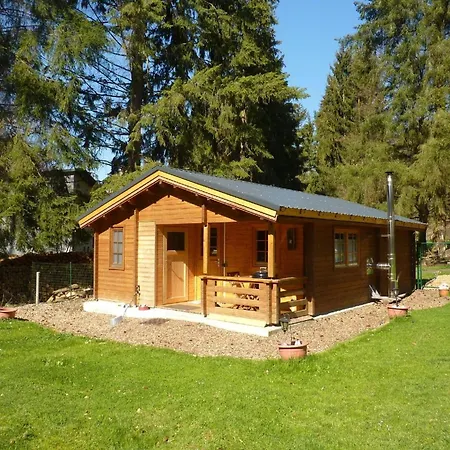Holz-blockhaus Fuer Vier Personen Mit Terrasse Und Komplett Eingezaeuntem Grundstueck Beltheim